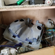 My storage bins are a mess of old Vespa parts and other crap.